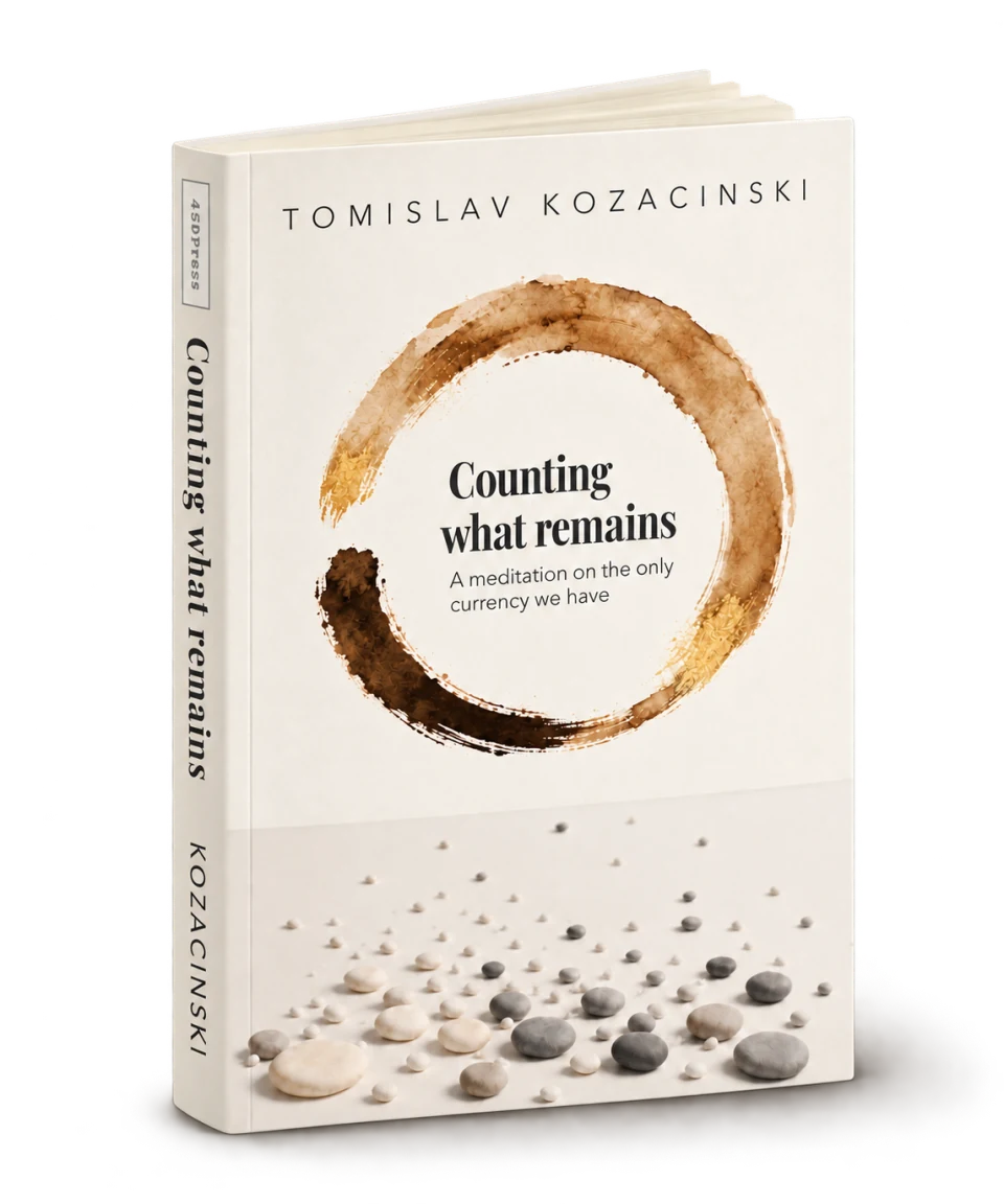 Counting what remains by Tomislav Kozacinski, shown standing slightly open with its front cover and spine visible.